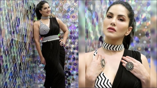 Sunny Leone slays smoking hot festive look in sheer black saree, backless blouse(Instagram/sameerkatariya92/sunnyleone)