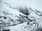 Himachal Pradesh received snowfall on Sunday, leading to a dip in the mercury and blocked roads. (HT Photo) Himachal Pradesh received snowfall on Sunday, leading to a dip in the mercury and blocked roads. (HT Photo)