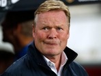 The fans gathered around Ronald Koeman's car and shouted insults at the Barcelona manager.