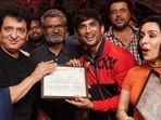 Sushant was seen in two different looks in his last theatrical release, Chhichhore. Here, he is seen as the younger version of his character, with co-star Shraddha Kapoor as the two proudly show off their college certificates during the making of the film.