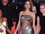 Angelina Jolie dresses up in silver bodycon gown with Zahara Jolie-Pitt and Shiloh for Eternals premiere(AFP) Angelina Jolie dresses up in silver bodycon gown with Zahara Jolie-Pitt and Shiloh for Eternals premiere(AFP)