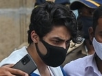 Aryan Khan being escorted to court by Narcotics Control Bureau (NCB) officials.(AFP) Aryan Khan being escorted to court by Narcotics Control Bureau (NCB) officials.(AFP)