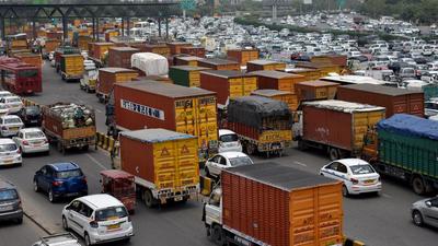 Gurugram sees a heavy presence of trucks as the NH-48 passes through it. In the case, a truck was impounded for overloading and the vehicle parked at the facility as the trucker did not have funds to pay the penalty. (Representational image/HT Archive) Gurugram sees a heavy presence of trucks as the NH-48 passes through it. In the case, a truck was impounded for overloading and the vehicle parked at the facility as the trucker did not have funds to pay the penalty. (Representational image/HT Archive)