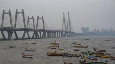 Mumbai civic body plans to construct two connecting bridges between the south-end of BWSL and the north end of the coastal road, which the fisherfolk said will constrict the only navigational route available to boats as they commute to their fishing grounds. (HT FILE) Mumbai civic body plans to construct two connecting bridges between the south-end of BWSL and the north end of the coastal road, which the fisherfolk said will constrict the only navigational route available to boats as they commute to their fishing grounds. (HT FILE)
