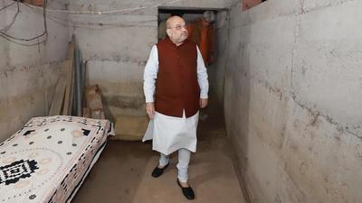 Union home minister Amit Shah inspects a bunker during a visit to Maqwal on the Jammu border on Sunday. He wraps up his Jammu and Kashmir visit on Monday. (PTI)