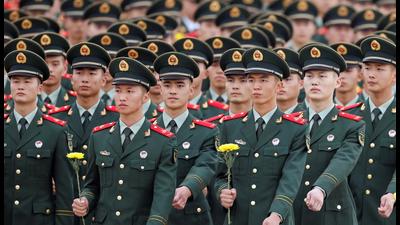 Members of People's Liberation Army (PLA) prepare to lay flowers at the Monument to the People’s Heroes during a ceremony on Tiananmen Square to mark Martyrs' Day, in Beijing, China last month. A former chairperson of China’s state defence giant China North Industries Group Co (Norinco Group), a Fortune 500 company, has been arrested on corruption charges, official media has reported. (REUTERS) Members of People's Liberation Army (PLA) prepare to lay flowers at the Monument to the People’s Heroes during a ceremony on Tiananmen Square to mark Martyrs' Day, in Beijing, China last month. A former chairperson of China’s state defence giant China North Industries Group Co (Norinco Group), a Fortune 500 company, has been arrested on corruption charges, official media has reported. (REUTERS)