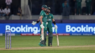 Dubai: Pakistan's Mohammad Rizwan, right, hugs captain Babar Azam to congratulate him for scoring 50 runs during the Cricket Twenty20 World Cup match between India and Pakistan in Dubai, UAE, Sunday (AP)