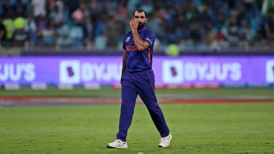 Dubai: India's Mohammed Shami reacts after he was hit by three consecutive boundaries during the Cricket Twenty20 World Cup match between India and Pakistan in Dubai, UAE, Sunday, Oct. 24, 2021. AP/PTI Photo(AP10_24_2021_000211B) (AP) Dubai: India's Mohammed Shami reacts after he was hit by three consecutive boundaries during the Cricket Twenty20 World Cup match between India and Pakistan in Dubai, UAE, Sunday, Oct. 24, 2021. AP/PTI Photo(AP10_24_2021_000211B) (AP)