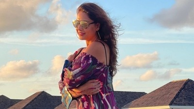 Bipasha Basu in printed mini dress enjoys golden hour in Maldives, can you guess the price? Bipasha Basu in printed mini dress enjoys golden hour in Maldives, can you guess the price?