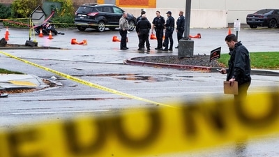 Police collect evidence in a parking lot near Dave and Busters near the Boise Towne Square shopping mall where a shooting occurred in Boise, Idaho. (AP) Police collect evidence in a parking lot near Dave and Busters near the Boise Towne Square shopping mall where a shooting occurred in Boise, Idaho. (AP)