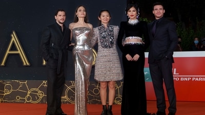 Kit Harington, Angelina Jolie, director Chloé Zhao, Gemma Chan, and Richard Madden posed on the red carpet at the 16th edition of the Rome Film Fest. Their film Eternals premiered at the festival last night. (AP) Kit Harington, Angelina Jolie, director Chloé Zhao, Gemma Chan, and Richard Madden posed on the red carpet at the 16th edition of the Rome Film Fest. Their film Eternals premiered at the festival last night. (AP)