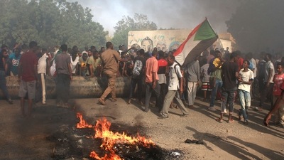 Sudanese man protest against a military coup that overthrew the transition to civilian rule. (AFP) Sudanese man protest against a military coup that overthrew the transition to civilian rule. (AFP)