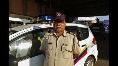 Thane police commissionerate’s constable Rajendra Dhumal of Kongaon police station, Bhiwandi, Thane. He is one of the two constables to save the life of a biker who suffered from seizures while riding recently. (PRAFUL GANGURDE/HT PHOTO) Thane police commissionerate’s constable Rajendra Dhumal of Kongaon police station, Bhiwandi, Thane. He is one of the two constables to save the life of a biker who suffered from seizures while riding recently. (PRAFUL GANGURDE/HT PHOTO)
