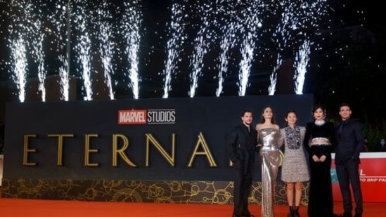 Kit Harington, Angelina Jolie, Chloé Zhao, Gemma Chan, and Richard Madden pose on the red carpet for the movie Eternals at the 16th edition of the Rome Film Fest. (AP Photo/Domenico Stinellis)(AP)