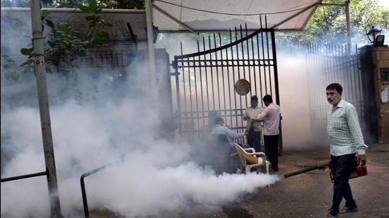 An NDMC health worker fumigates an area in New Delhi as a preventive measure against the spread of dengue. There’s been no relief for Delhi residents after a drop in Covid-19 cases as dengue cases have been on the rise. (Arvind Yadav/HT PHOTO) An NDMC health worker fumigates an area in New Delhi as a preventive measure against the spread of dengue. There’s been no relief for Delhi residents after a drop in Covid-19 cases as dengue cases have been on the rise. (Arvind Yadav/HT PHOTO)