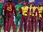 West Indies players, right, congratulate South Africa's Rassie van der Dussen, left, and Aiden Markram following their Twenty20 World Cup in Dubai.(AP) West Indies players, right, congratulate South Africa's Rassie van der Dussen, left, and Aiden Markram following their Twenty20 World Cup in Dubai.(AP)