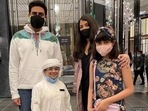 Abhishek Bachchan, Aishwarya Rai and Aaradhya pose with a fan. Abhishek Bachchan, Aishwarya Rai and Aaradhya pose with a fan.