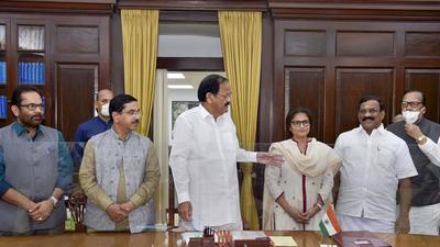 Vice-President M Venkaiah Naidu with newly elected Rajya Sabha members Sushmita Dev and S Selvaganapathy along with others at Parliament House in New Delhi on Tuesday. (PTI)