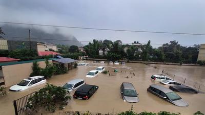 Cars are seen submerged in floodwaters at a resort hotel as heavy rainfall caused the Kosi river to overflow at the Jim Corbett National Park in Uttarakhand, India on October 19, 2021. (AP/File) Cars are seen submerged in floodwaters at a resort hotel as heavy rainfall caused the Kosi river to overflow at the Jim Corbett National Park in Uttarakhand, India on October 19, 2021. (AP/File)