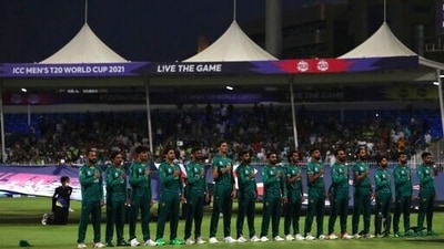 Pakistan players stand for their national anthem before the start of the Cricket Twenty20 World Cup match between New Zealand and Pakistan in Sharjah, UAE, Tuesday, Oct. 26, 2021. (AP Photo/Aijaz Rahi) (AP) Pakistan players stand for their national anthem before the start of the Cricket Twenty20 World Cup match between New Zealand and Pakistan in Sharjah, UAE, Tuesday, Oct. 26, 2021. (AP Photo/Aijaz Rahi) (AP)