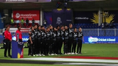 New Zealand players stand for their national anthem before the start of the Cricket Twenty20 World Cup match between New Zealand and Pakistan in Sharjah, UAE, Tuesday, Oct. 26, 2021. (AP Photo/Aijaz Rahi) (AP) New Zealand players stand for their national anthem before the start of the Cricket Twenty20 World Cup match between New Zealand and Pakistan in Sharjah, UAE, Tuesday, Oct. 26, 2021. (AP Photo/Aijaz Rahi) (AP)