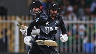 New Zealand's captain Kane Williamson, left, and Devon Conway run between the wickets and during the Cricket Twenty20 World Cup match between New Zealand and Pakistan in Sharjah, UAE, Tuesday, Oct. 26, 2021. (AP Photo/Aijaz Rahi) (AP) New Zealand's captain Kane Williamson, left, and Devon Conway run between the wickets and during the Cricket Twenty20 World Cup match between New Zealand and Pakistan in Sharjah, UAE, Tuesday, Oct. 26, 2021. (AP Photo/Aijaz Rahi) (AP)