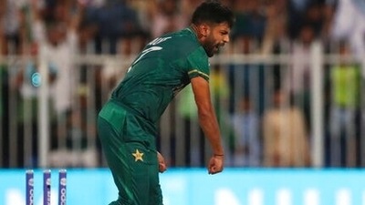 Pakistan's Haris Rauf celebrates the dismissal of New Zealand's Mitchell Santner during the Cricket Twenty20 World Cup match between New Zealand and Pakistan in Sharjah, UAE, Tuesday, Oct. 26, 2021. (AP Photo/Aijaz Rahi) (AP) Pakistan's Haris Rauf celebrates the dismissal of New Zealand's Mitchell Santner during the Cricket Twenty20 World Cup match between New Zealand and Pakistan in Sharjah, UAE, Tuesday, Oct. 26, 2021. (AP Photo/Aijaz Rahi) (AP)