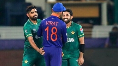 Indian cricket captain Virat Kohli congratulates Pakistan's Mohammad Rizwan, right, and Babar Azam after Pakistan won the Cricket Twenty20 World Cup match between India and Pakistan in Dubai (AP) Indian cricket captain Virat Kohli congratulates Pakistan's Mohammad Rizwan, right, and Babar Azam after Pakistan won the Cricket Twenty20 World Cup match between India and Pakistan in Dubai (AP)