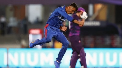 Mujeeb Ur Rahman of Afghanistan celebrates the wicket of Kyle Coetzer of Scotland during the ICC Men's T20 World Cup match between Afghanistan and Scotland, at Sharjah Cricket Stadium, in Sharjah on Monday. (ANI)