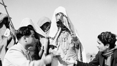 Studio/January, 1952, A31A. Election Scenes in Delhi (January, 1952). Village women voters approach a Polling Officer for receiving ballot papers at a rural Polling Station, near Delhi. (Courtesy PHOTO DIVISION) Studio/January, 1952, A31A. Election Scenes in Delhi (January, 1952). Village women voters approach a Polling Officer for receiving ballot papers at a rural Polling Station, near Delhi. (Courtesy PHOTO DIVISION)