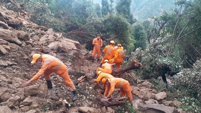 Members of National Disaster Response Force (NDRF) search the debris after a landslide caused by heavy rainfall at Dungri village in Chamoli district, in the northern state of Uttarakhand. (File photo / Reuters)