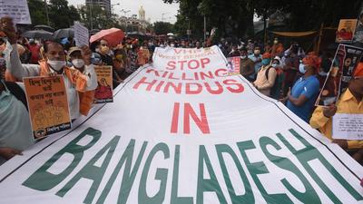 Vishwa Hindu Parishad (VHP), Hindu Jagran Manch and other Hindu activist groups members protest against the Bangladesh government on the issue of recent temple vandalisations during Durga Puja in Bangladesh at Esplanade in Kolkata, October 19, 2021 (Samir Jana/HT Photo) Vishwa Hindu Parishad (VHP), Hindu Jagran Manch and other Hindu activist groups members protest against the Bangladesh government on the issue of recent temple vandalisations during Durga Puja in Bangladesh at Esplanade in Kolkata, October 19, 2021 (Samir Jana/HT Photo)