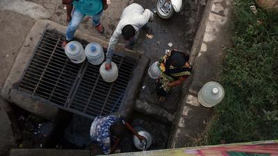Residents of Susgaon continue to remain deprived of water supply from the Pune Municipal Corporation (PMC), with a majority of the village dependent on water tankers. (HT PHOTO)