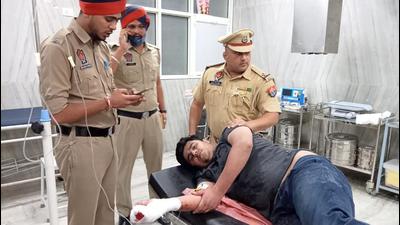 The victim undergoing treatment at a hospital after the carjacking in Mohali late on Monday night.