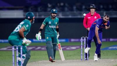 A moment from the India vs Pakistan World T20 match in Dubai that was played on Sunday. Jammu and Kashmir police filed cases under UAPA over alleged videos of people celebrating Pakistan’s win. (REUTERS)
