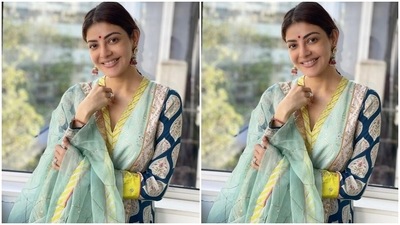 To accessorise the ethnic outfit, Kajal chose kundan drop earrings, rings, and matching bangles. A centre-parted sleek braided hairdo, nude lip shade, blushed cheeks, a dainty bindi, and a glowing face rounded off Kajal's beauty picks. (Instagram/@sayali_vidya)