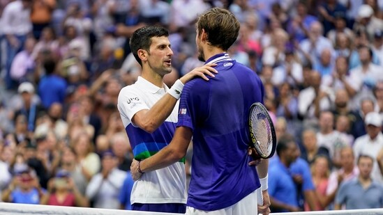 Novak Djokovic, of Serbia, left, congratulates Daniil Medvedev, of Russia(AP)