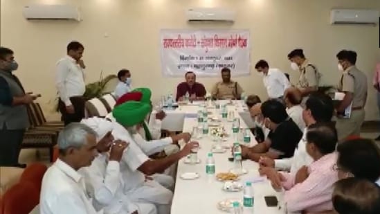 Representatives of the Haryana government and protesting farmers hold talks on Tuesday. (ANI Twitter)