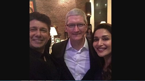 The image shows Shriram Nene and Madhuri Dixit with Tim Cook.(Instagram/@drneneofficial)