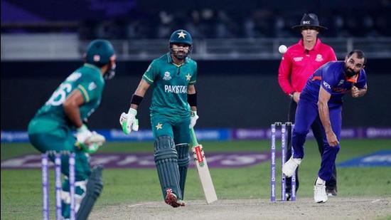 A moment from the India vs Pakistan World T20 match in Dubai that was played on Sunday. Jammu and Kashmir police filed cases under UAPA over alleged videos of people celebrating Pakistan’s win. (REUTERS)