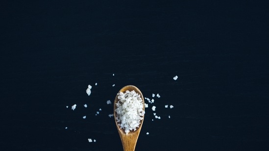 Gargle with salt water: Gargling with warm salt water several times a day can soothe sore throat and clear mucous.(Unsplash)