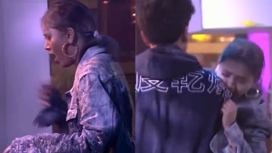 Karan Kundraa lifts Tejasswi Prakash in his arms. 