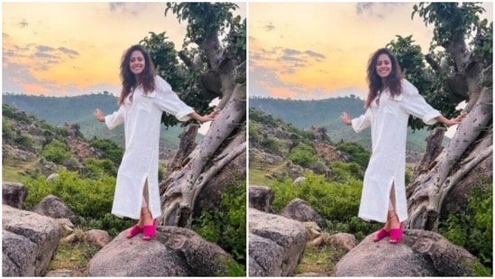 Nushrratt left her shoulder-length tresses open in wavy curls as she posed against the backdrop of a tree.(Instagram/@nushrrattbharuccha)