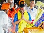 Delhi Chief Minister Arvind Kejriwal offers prayers at Saryu Ghat in Ayodhya on Monday. (ANI) Delhi Chief Minister Arvind Kejriwal offers prayers at Saryu Ghat in Ayodhya on Monday. (ANI)