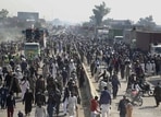 Supporters of Tehreek-e-Labiak Pakistan, a radical Islamist party, take part in a protest march toward Islamabad, on a highway in the town of Sadhuke, in eastern Pakistan(AP Photo) Supporters of Tehreek-e-Labiak Pakistan, a radical Islamist party, take part in a protest march toward Islamabad, on a highway in the town of Sadhuke, in eastern Pakistan(AP Photo)