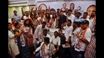 The corporators, who joined NCP from BJP (Ulhasnagar) with the Housing Minister, Jitendra Awhad, in Thane on Wednesday. (PRAFUL GANGURDE/HT PHOTO) The corporators, who joined NCP from BJP (Ulhasnagar) with the Housing Minister, Jitendra Awhad, in Thane on Wednesday. (PRAFUL GANGURDE/HT PHOTO)