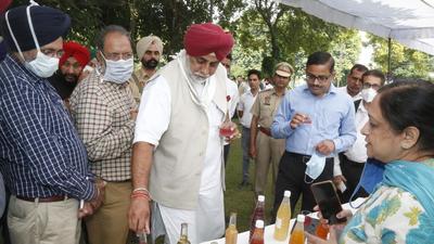 Punjab agriculture minister Randeep Singh Nabha at an exhibition stall during a visit to Punjab Agricultural University in Ludhiana on Wednesday. (HT Photo)