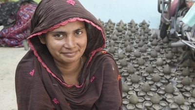 Indian potters suffered a lot financially since the first wave of the COVID-19 pandemic hit the country last year, but are now hoping to revive the business and their financial condition from the sale of earthen lamps ahead of Diwali. (HT Photo/Deepak Gupta)