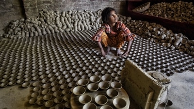 As Diwali approaches, potters in different parts of India are gearing up to increase the production of earthen lamps. (HT Photo/Deepak Gupta)