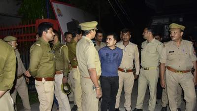 Police personnel deployed amid rumours of Kiran Gosavi’s surrender in connection to the Mumbai cruise ship drug case, at Mandiaon police station, in Lucknow, Uttar Pradesh, on October 25. (HT) Police personnel deployed amid rumours of Kiran Gosavi’s surrender in connection to the Mumbai cruise ship drug case, at Mandiaon police station, in Lucknow, Uttar Pradesh, on October 25. (HT)